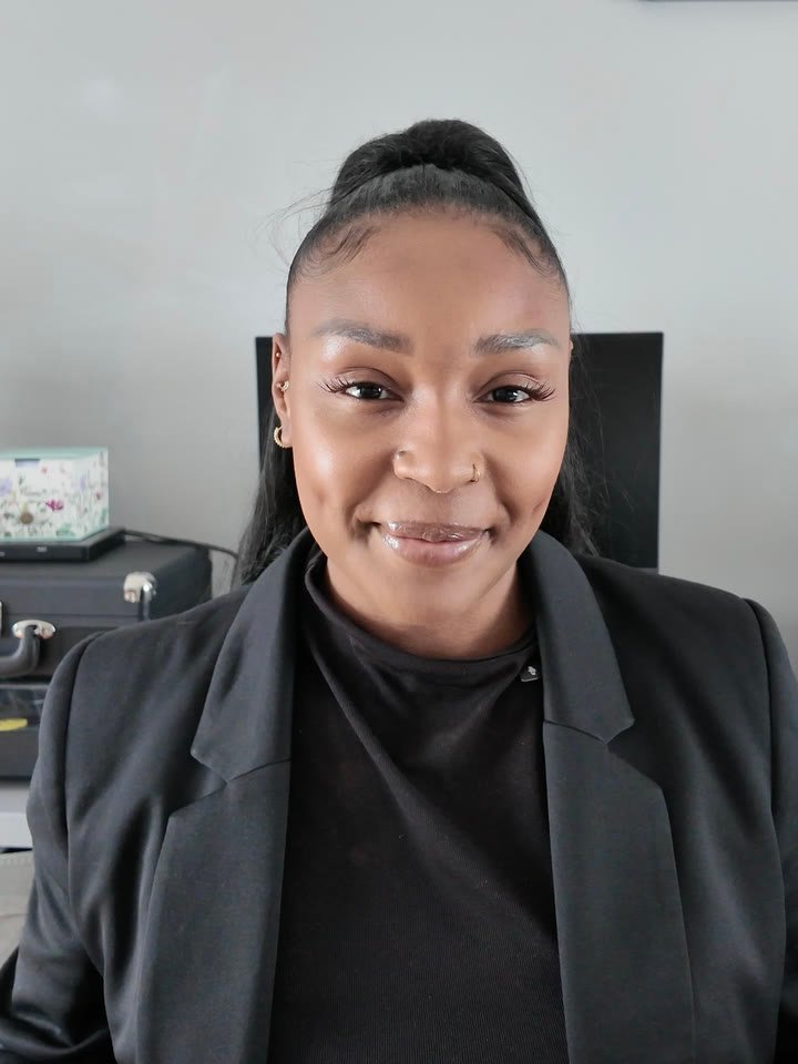 Portrait of Shana Francis in a black blazer